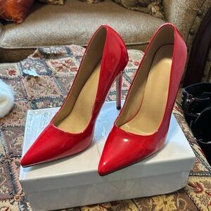 Patent leather, red heel pumps